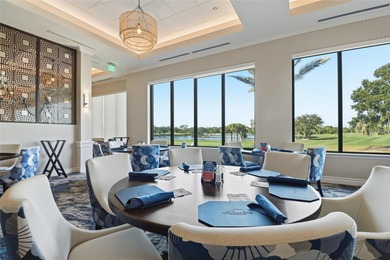 Elegant 1st-Floor Barrington Model with Serene Water & Golf on Heritage Oaks Golf and Country Club in Florida - for sale on GolfHomes.com, golf home, golf lot