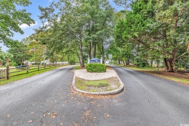 Located just a stone's throw from the beach, this charming home on Tupelo Bay Golf Complex  in South Carolina - for sale on GolfHomes.com, golf home, golf lot