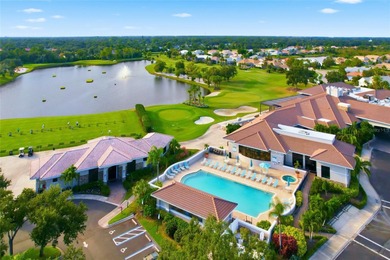 Elegant 1st-Floor Barrington Model with Serene Water & Golf on Heritage Oaks Golf and Country Club in Florida - for sale on GolfHomes.com, golf home, golf lot