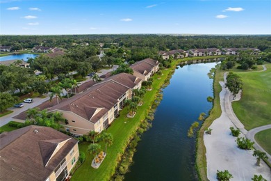 Elegant 1st-Floor Barrington Model with Serene Water & Golf on Heritage Oaks Golf and Country Club in Florida - for sale on GolfHomes.com, golf home, golf lot