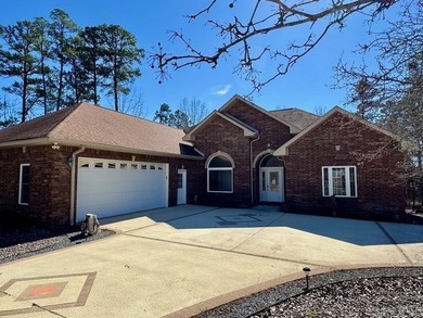 Beautiful one level traditional style home nestled on a private on Coronado Golf Course in Arkansas - for sale on GolfHomes.com, golf home, golf lot