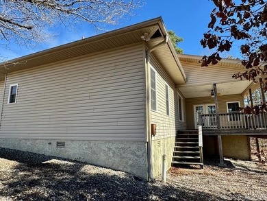 Beautiful one level traditional style home nestled on a private on Coronado Golf Course in Arkansas - for sale on GolfHomes.com, golf home, golf lot