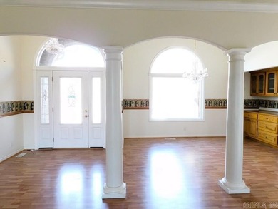 Beautiful one level traditional style home nestled on a private on Coronado Golf Course in Arkansas - for sale on GolfHomes.com, golf home, golf lot