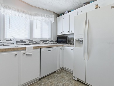 Welcome to this well-maintained and updated 2-bedroom, 2-bath on Plantation Golf Club in Florida - for sale on GolfHomes.com, golf home, golf lot