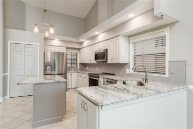 TIMBER GREENS - BEAUTIFULLY REMODELED along the 17th fairway on Timber Greens Country Club in Florida - for sale on GolfHomes.com, golf home, golf lot
