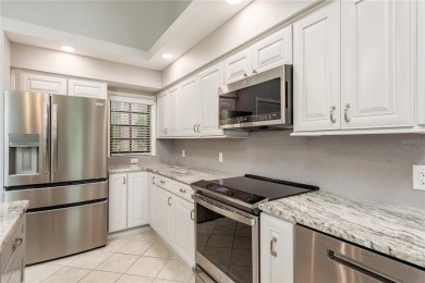 TIMBER GREENS - BEAUTIFULLY REMODELED along the 17th fairway on Timber Greens Country Club in Florida - for sale on GolfHomes.com, golf home, golf lot