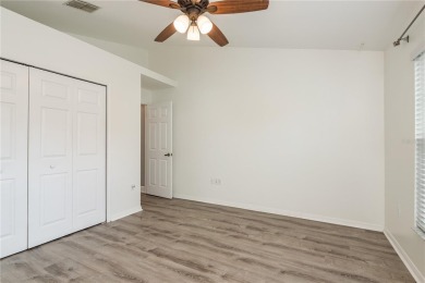 TIMBER GREENS - BEAUTIFULLY REMODELED along the 17th fairway on Timber Greens Country Club in Florida - for sale on GolfHomes.com, golf home, golf lot