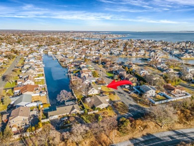 Welcome Home to your newly renovated waterfront oasis nestled on Bergen Point Golf Course in New York - for sale on GolfHomes.com, golf home, golf lot