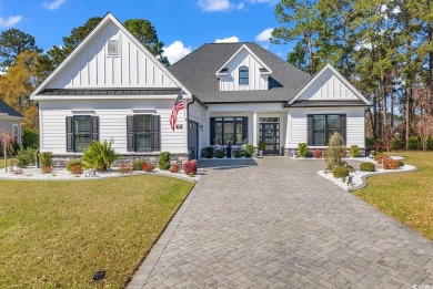 Luxurious custom built craftsman style home features 4 bedrooms on Myrtle Beach National Golf Course in South Carolina - for sale on GolfHomes.com, golf home, golf lot