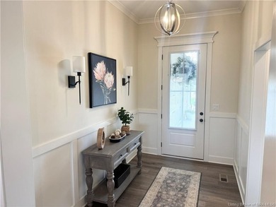 Situated along the sixth fairway of the beautiful Champions on Champions Pointe Golf Course in Indiana - for sale on GolfHomes.com, golf home, golf lot