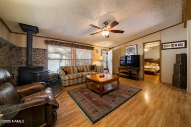 Escape to the cool mountain air in this inviting 3BR/2BA home in on Pinewood Country Club in Arizona - for sale on GolfHomes.com, golf home, golf lot