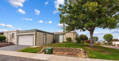 Set on an elevated corner lot in Oceana--Oceanside's premier 55+ on Emerald Isle Golf Course in California - for sale on GolfHomes.com, golf home, golf lot