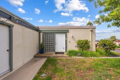 Set on an elevated corner lot in Oceana--Oceanside's premier 55+ on Emerald Isle Golf Course in California - for sale on GolfHomes.com, golf home, golf lot