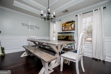 Elegant open-concept living in Fairfield Plantation. This on Fairfield Plantation Golf and Country Club in Georgia - for sale on GolfHomes.com, golf home, golf lot