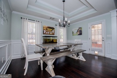 Elegant open-concept living in Fairfield Plantation. This on Fairfield Plantation Golf and Country Club in Georgia - for sale on GolfHomes.com, golf home, golf lot