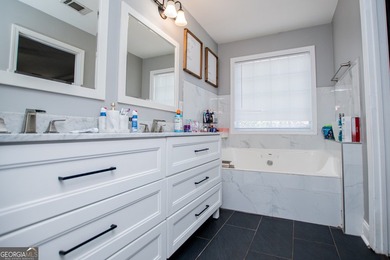 Elegant open-concept living in Fairfield Plantation. This on Fairfield Plantation Golf and Country Club in Georgia - for sale on GolfHomes.com, golf home, golf lot