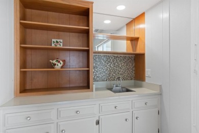 Set on an elevated corner lot in Oceana--Oceanside's premier 55+ on Emerald Isle Golf Course in California - for sale on GolfHomes.com, golf home, golf lot