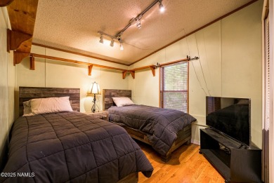 Escape to the cool mountain air in this inviting 3BR/2BA home in on Pinewood Country Club in Arizona - for sale on GolfHomes.com, golf home, golf lot