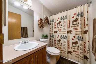 Escape to the cool mountain air in this inviting 3BR/2BA home in on Pinewood Country Club in Arizona - for sale on GolfHomes.com, golf home, golf lot