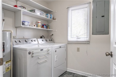 LOCATION AND CONVENIENCE! Short term rental capability!! Calling on Hyland Golf Club in North Carolina - for sale on GolfHomes.com, golf home, golf lot