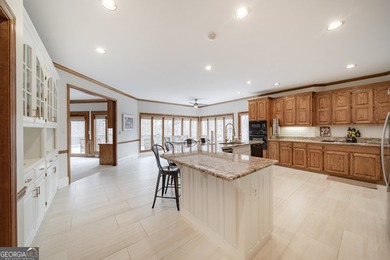 Tucked within the sought-after Estates section of Horseshoe Bend on Horseshoe Bend Country Club in Georgia - for sale on GolfHomes.com, golf home, golf lot