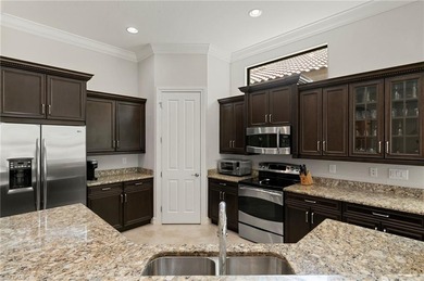 Welcome to this light, bright, and beautifully finished on The Club At Olde Cypress in Florida - for sale on GolfHomes.com, golf home, golf lot