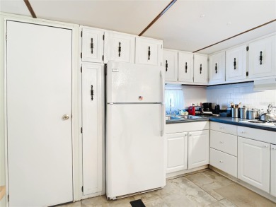 CHARMING, UNIQUE, MOBILE HOME IN FABULOUS HOLIDAY PARK, A on Sabal Trace Golf and Country Club in Florida - for sale on GolfHomes.com, golf home, golf lot