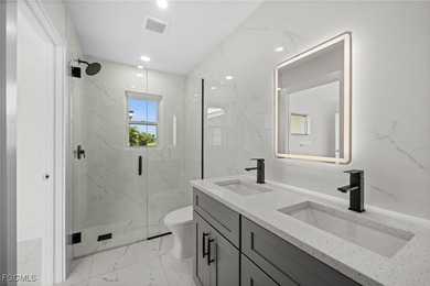 Beautifully updated pool home located on a golf course, offering on Rotonda Golf and Country Club The Hills Course in Florida - for sale on GolfHomes.com, golf home, golf lot