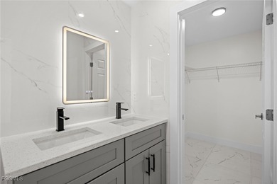 Beautifully updated pool home located on a golf course, offering on Rotonda Golf and Country Club The Hills Course in Florida - for sale on GolfHomes.com, golf home, golf lot