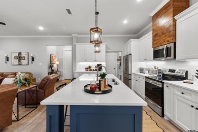 This inviting home welcomes you the moment you step through the on Hide-A-Way Lake Golf Course in Texas - for sale on GolfHomes.com, golf home, golf lot