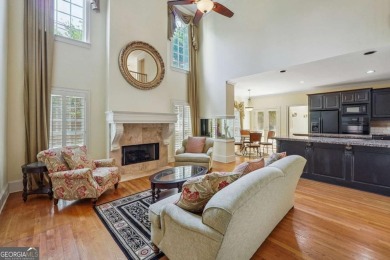 Experience three fully finished levels of exceptional living on The Golf Club of Georgia in Georgia - for sale on GolfHomes.com, golf home, golf lot