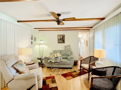 CHARMING, UNIQUE, MOBILE HOME IN FABULOUS HOLIDAY PARK, A on Sabal Trace Golf and Country Club in Florida - for sale on GolfHomes.com, golf home, golf lot