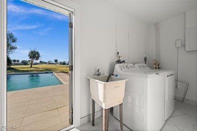 Beautifully updated pool home located on a golf course, offering on Rotonda Golf and Country Club The Hills Course in Florida - for sale on GolfHomes.com, golf home, golf lot