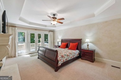 Experience three fully finished levels of exceptional living on The Golf Club of Georgia in Georgia - for sale on GolfHomes.com, golf home, golf lot