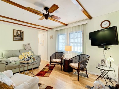 CHARMING, UNIQUE, MOBILE HOME IN FABULOUS HOLIDAY PARK, A on Sabal Trace Golf and Country Club in Florida - for sale on GolfHomes.com, golf home, golf lot