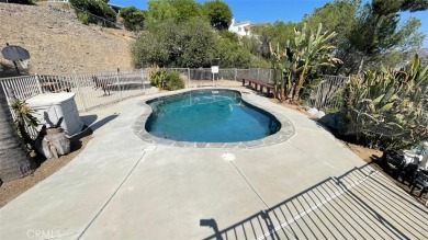 Beautifully remodeled in 2023-24, this multi-level Canyon Lake on Canyon Lake Country Club in California - for sale on GolfHomes.com, golf home, golf lot