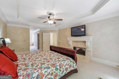 Experience three fully finished levels of exceptional living on The Golf Club of Georgia in Georgia - for sale on GolfHomes.com, golf home, golf lot