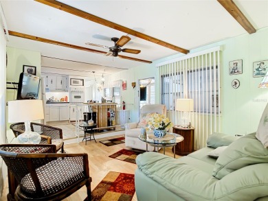 CHARMING, UNIQUE, MOBILE HOME IN FABULOUS HOLIDAY PARK, A on Sabal Trace Golf and Country Club in Florida - for sale on GolfHomes.com, golf home, golf lot