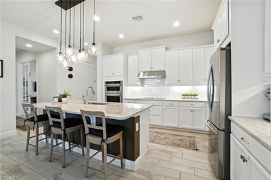 Modern, move-in ready, and effortlessly fresh, this on Vanderbilt Country Club in Florida - for sale on GolfHomes.com, golf home, golf lot