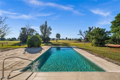 Beautifully updated pool home located on a golf course, offering on Rotonda Golf and Country Club The Hills Course in Florida - for sale on GolfHomes.com, golf home, golf lot