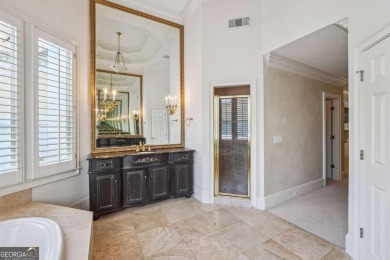 Experience three fully finished levels of exceptional living on The Golf Club of Georgia in Georgia - for sale on GolfHomes.com, golf home, golf lot