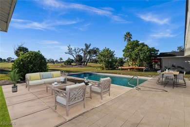 Beautifully updated pool home located on a golf course, offering on Rotonda Golf and Country Club The Hills Course in Florida - for sale on GolfHomes.com, golf home, golf lot