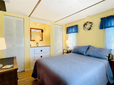 CHARMING, UNIQUE, MOBILE HOME IN FABULOUS HOLIDAY PARK, A on Sabal Trace Golf and Country Club in Florida - for sale on GolfHomes.com, golf home, golf lot