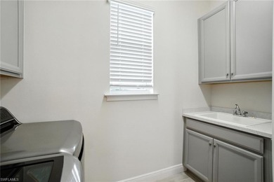 Modern, move-in ready, and effortlessly fresh, this on Vanderbilt Country Club in Florida - for sale on GolfHomes.com, golf home, golf lot