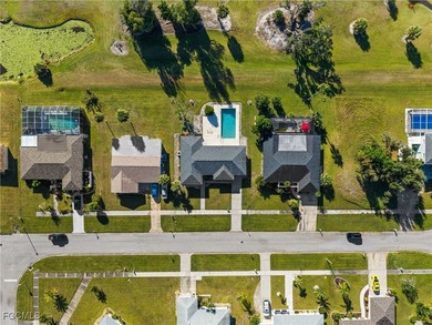 Beautifully updated pool home located on a golf course, offering on Rotonda Golf and Country Club The Hills Course in Florida - for sale on GolfHomes.com, golf home, golf lot