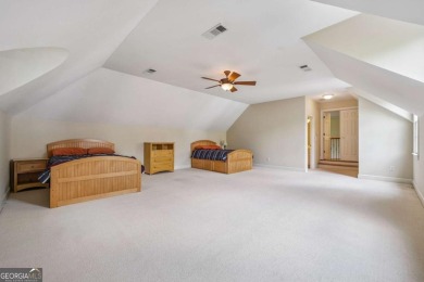 Experience three fully finished levels of exceptional living on The Golf Club of Georgia in Georgia - for sale on GolfHomes.com, golf home, golf lot