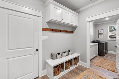 This inviting home welcomes you the moment you step through the on Hide-A-Way Lake Golf Course in Texas - for sale on GolfHomes.com, golf home, golf lot