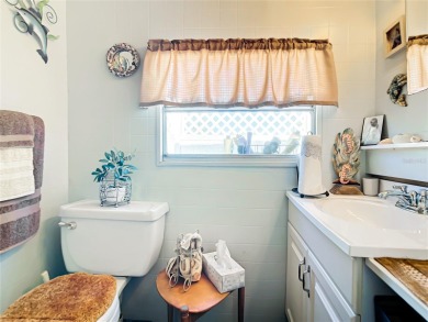 CHARMING, UNIQUE, MOBILE HOME IN FABULOUS HOLIDAY PARK, A on Sabal Trace Golf and Country Club in Florida - for sale on GolfHomes.com, golf home, golf lot