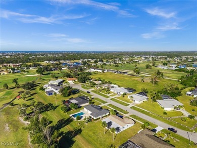 Beautifully updated pool home located on a golf course, offering on Rotonda Golf and Country Club The Hills Course in Florida - for sale on GolfHomes.com, golf home, golf lot