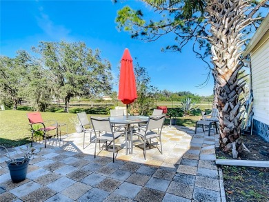 CHARMING, UNIQUE, MOBILE HOME IN FABULOUS HOLIDAY PARK, A on Sabal Trace Golf and Country Club in Florida - for sale on GolfHomes.com, golf home, golf lot